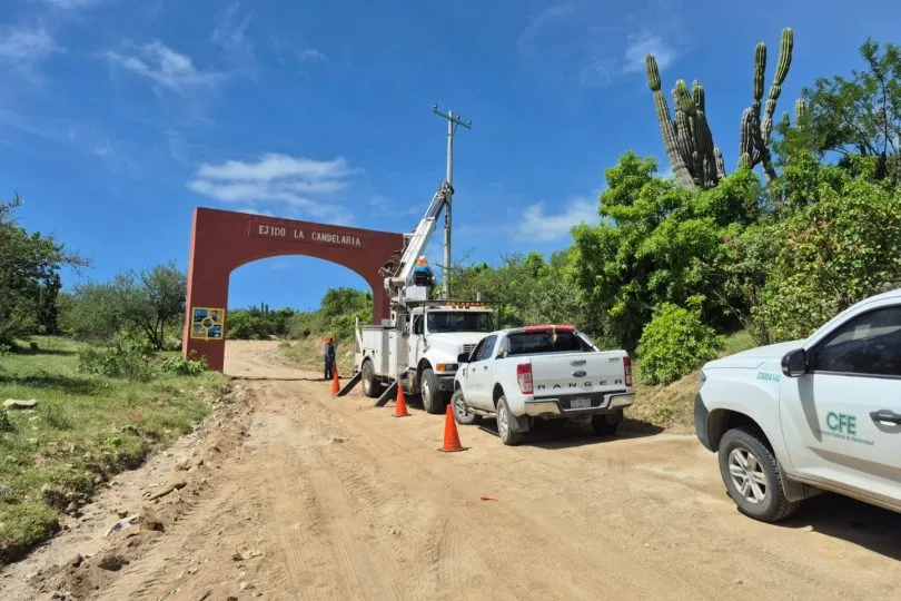 Utility poles being installed for the power grid in a rural Baja California Sur community