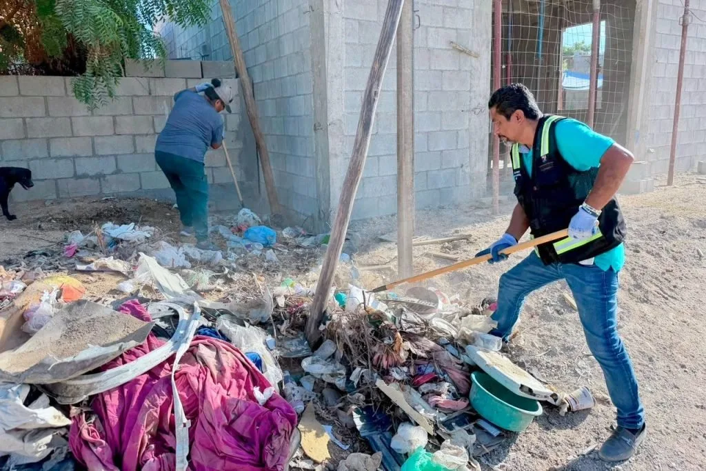 Municipal crew clearing an illegal dump site in the Real Unidad neighborhood of Cabo San Lucas